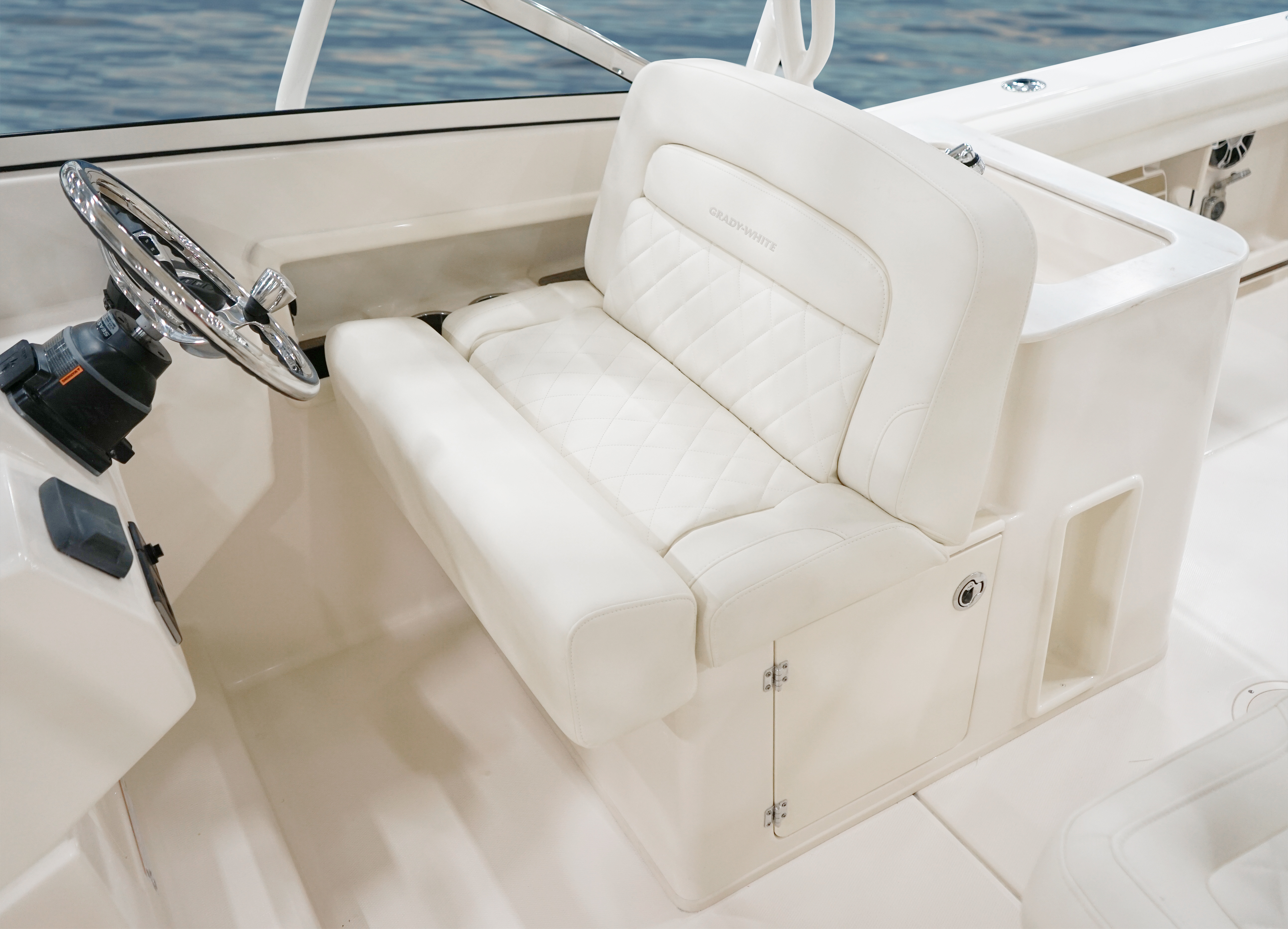 Grady-White Freedom 275 27 foot dual console helm bench seat with flip up bolsters and storage