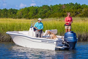 Grady-White Fisherman 180 18-foot center console fishing boat family with dog