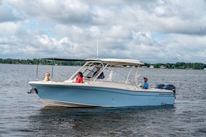 Grady-White Freedom 285 28-foot dual console boat port side with bow shade