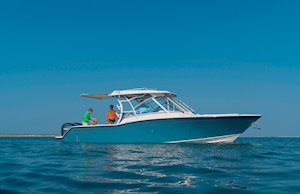 Grady-White Freedom 325 32-foot dual console fishing boat with sureshade