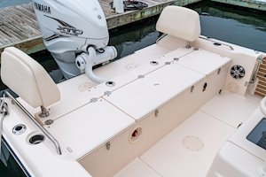 Grady White 281 CE Aft Bench Seat with port and starboard swing-open walk-through backrests