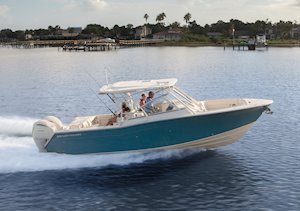 Grady-White Freedom 307 30-foot dual console running starboard side Seaport Blue